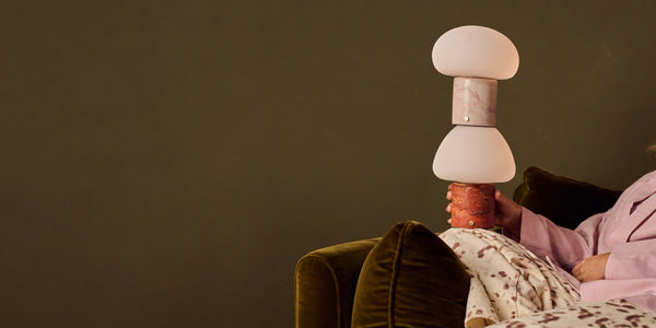 Interior styled with mixed natural stone rechargeable lamps reflecting 2027 lighting trends
