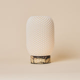 Tavellio Aurora cordless table lamp in yellow Calacatta Vionaro marble and ribbed porcelain