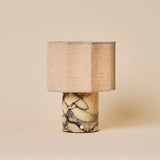 Tavellio Bonnard rechargeable table lamp with yellow Calacatta Vionaro marble base on a neutral studio backdrop