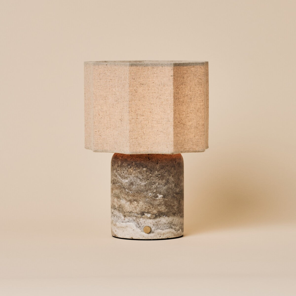 Rechargeable table lamp Bonnard Large in silver-grey travertine with linen shade, studio product shot