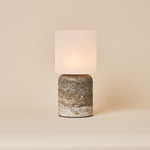 Cuyp Large rechargeable table lamp in silver grey travertine with a glowing glass shade