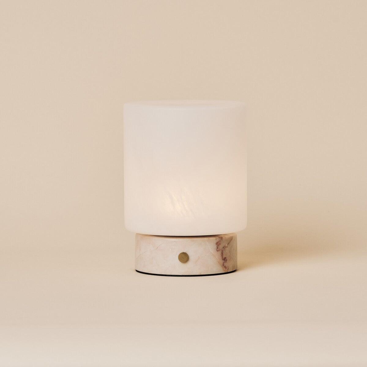 Tavellio Cuyp Small rechargeable table lamp with frosted cylinder shade and Rosa Aurora marble base