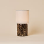 Dou Large rechargeable table lamp with dark emperador marble base and a natural linen drum shade