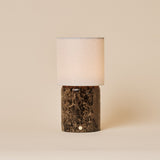 Dou Large rechargeable table lamp with dark emperador marble base and a natural linen drum shade