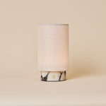 Floris cordless table lamp in Calacatta Vionaro white marble with linen shade on a soft studio background