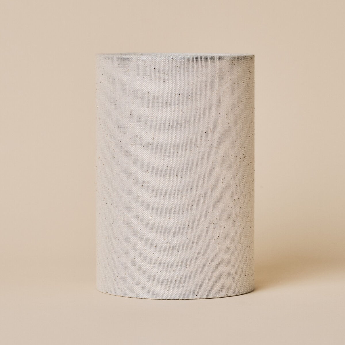 Removable linen lampshade from the Floris rechargeable table lamp shown on a cream background
