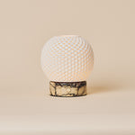 Mare Calacatta Vionaro Yellow rechargeable table lamp with gold-veined marble base, studio shot