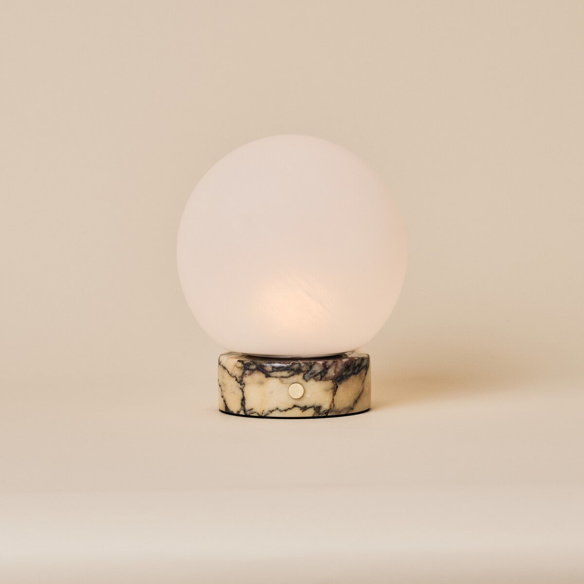 Cordless table lamp Metsu Small Calacatta Vionaro yellow marble base, plain studio shot