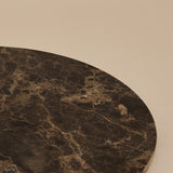 Close-up of Emperador Dark marble tray edge highlighting deep brown veining and texture