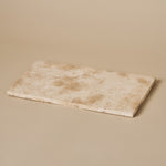 Nori medium Classic Travertine tray in warm beige travertine stone on a neutral studio background