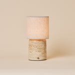 Onoda Large oplaadbare tafellamp in Classic Travertine steen op neutrale studioachtergrond