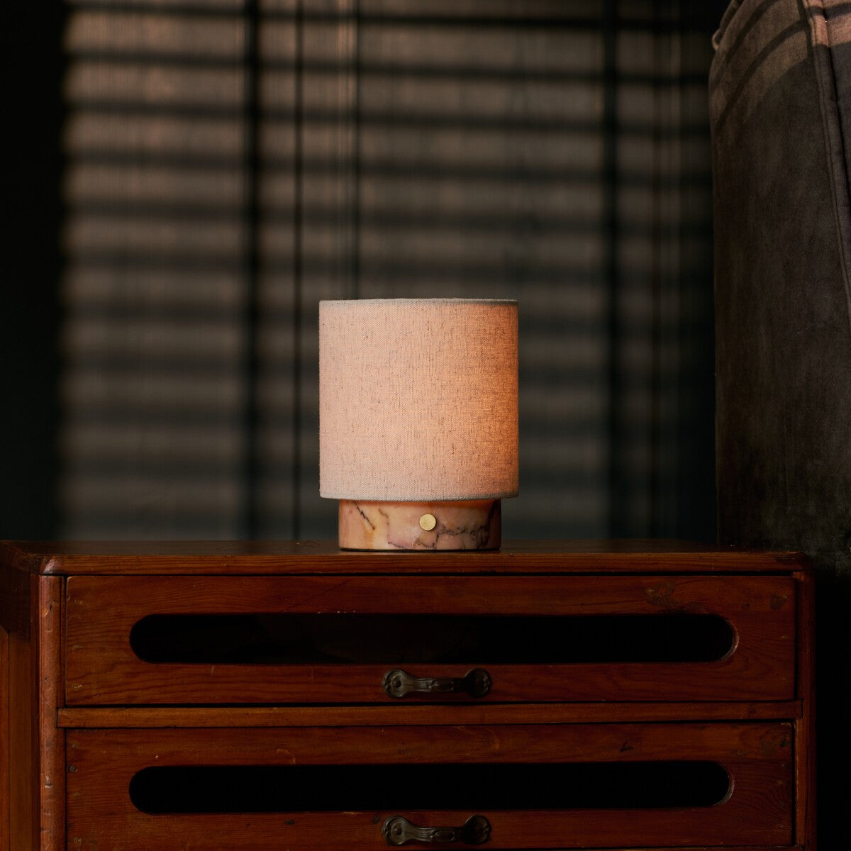 Rechargeable table lamp Onoda Small pink Calacatta marble base with linen shade on bedroom nightstand