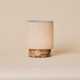 Cordless table lamp Onoda Small Calacatta Vionaro pink marble base on beige studio background