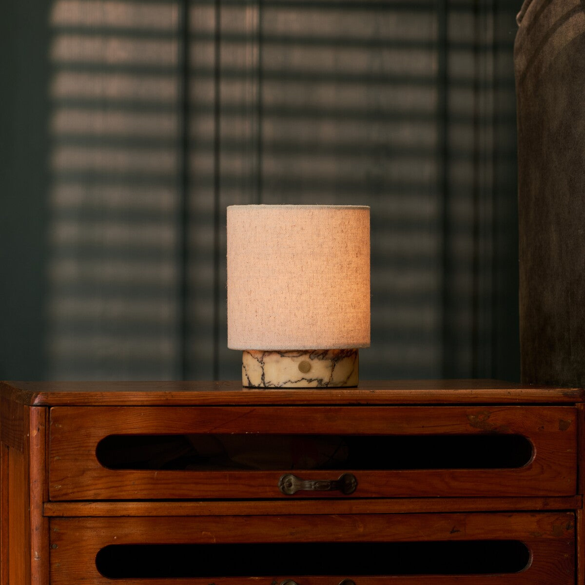 Cordless table lamp Onoda Small Calacatta Vionaro yellow marble base on beige studio background