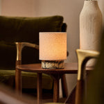 Rechargeable table lamp Onoda Small Calacatta Vionaro yellow marble base on wood side table