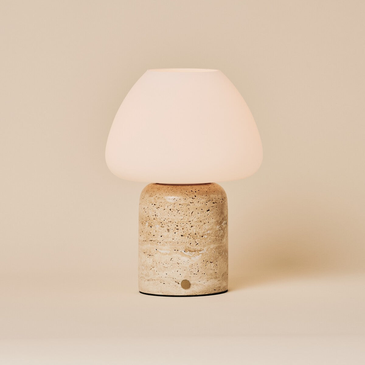Ostade cordless table lamp, beige travertine marble base and frosted glass dome shade