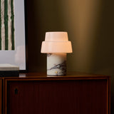 Pissarro rechargeable table lamp with two-tier opal shade and red marble base in living room