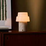 Rechargeable table lamp Pissarro with rosa aurora pink-veined marble base and frosted dome shade
