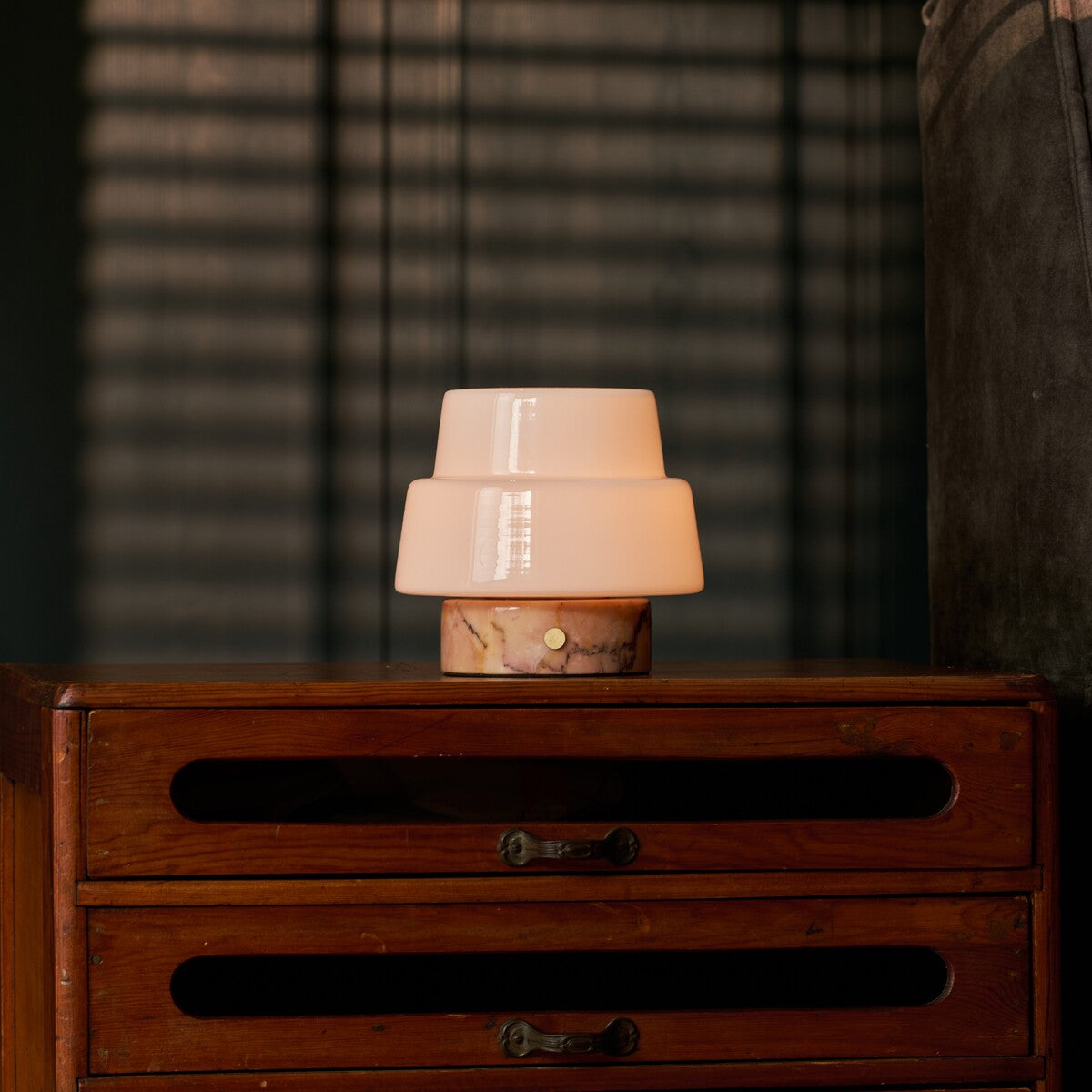 Rechargeable table lamp Pissarro Small Calacatta Vionaro Pink marble base glowing on nightstand