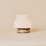 Cordless table lamp Pissarro Small Calacatta Vionaro Yellow Marble with tiered opal glass shade studio shot