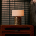 Rechargeable table lamp Redon Large Emperador Dark marble base, beige linen shade on wooden dresser