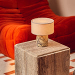 Cordless table lamp Redon in yellow Calacatta Vionaro marble on a marble side table