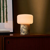 Cordless table lamp with Calacatta Vionaro yellow marble base and ribbed glass mushroom shade