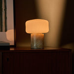 Rechargeable Renoir table lamp in honey onyx marble with ribbed white glass shade