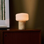 Renoir Medium cordless table lamp with honey onyx marble base and glowing ribbed glass shade