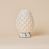 Rechargeable table lamp Serena Arabescato marble, white porcelain pinecone-textured shade