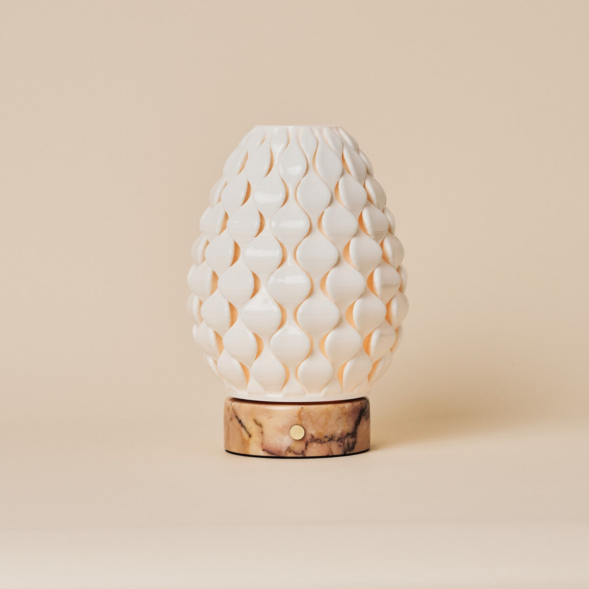 Serena rechargeable table lamp, white porcelain petal shade on pink marble base, studio shot