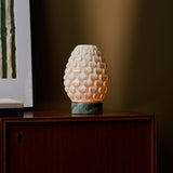 Rechargeable table lamp Serena Ice Green marble, ribbed porcelain shade on dark wood sideboard