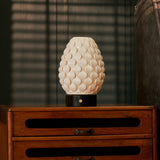 Serena cordless table lamp with white porcelain shade and Nero Marquina black marble base