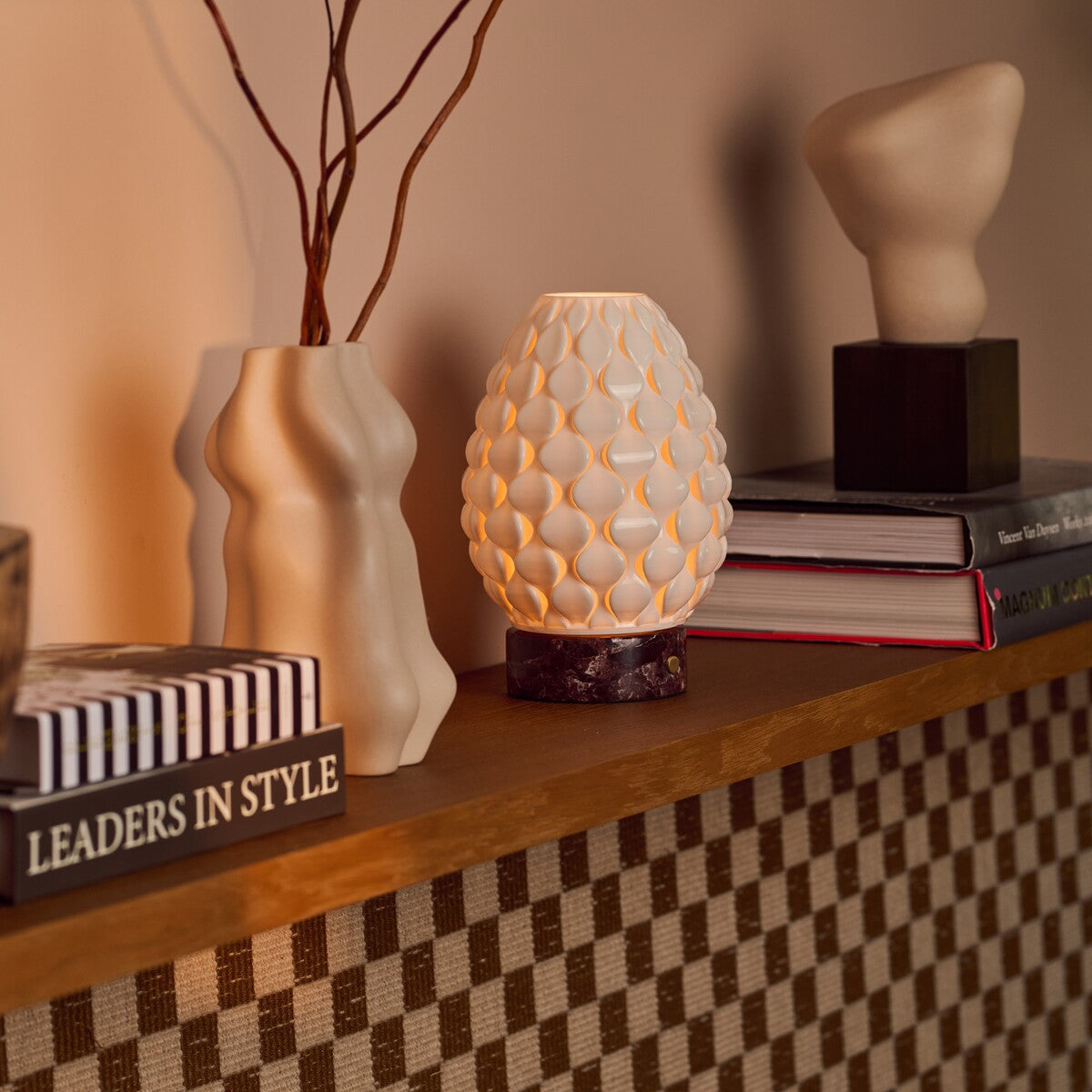 Serena Rosso Levanto marble rechargeable table lamp with scalloped porcelain shade against a beige backdrop