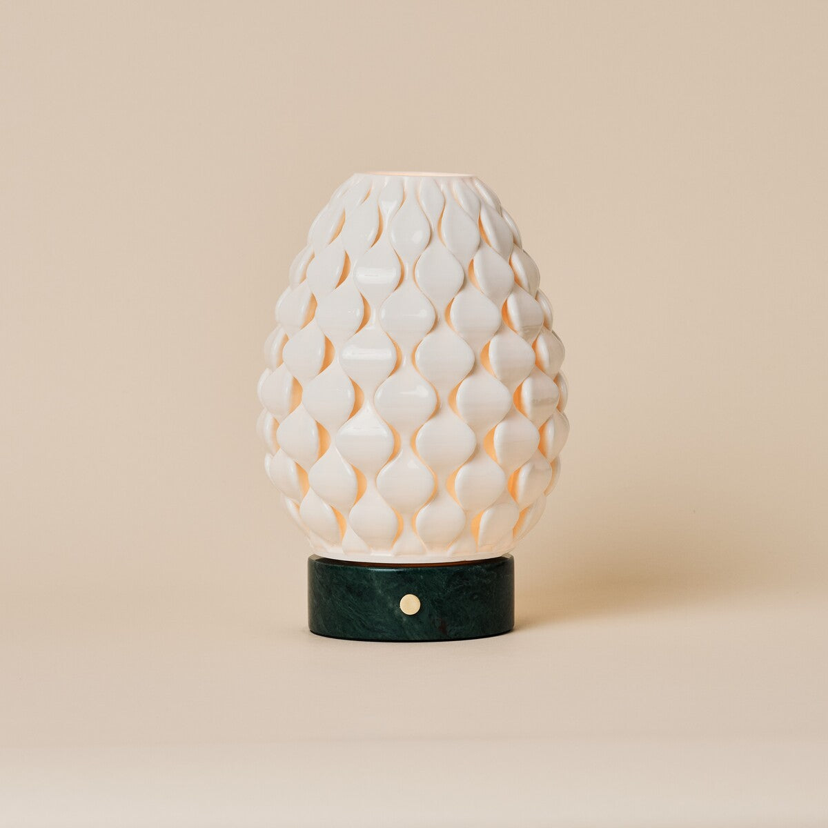 Serena Verde Alpi marble rechargeable table lamp with scalloped porcelain shade on a beige backdrop