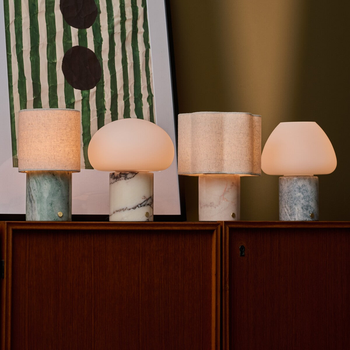 Tavellio Rijks Collection lineup of four marble rechargeable table lamps in green, white, red and grey stone