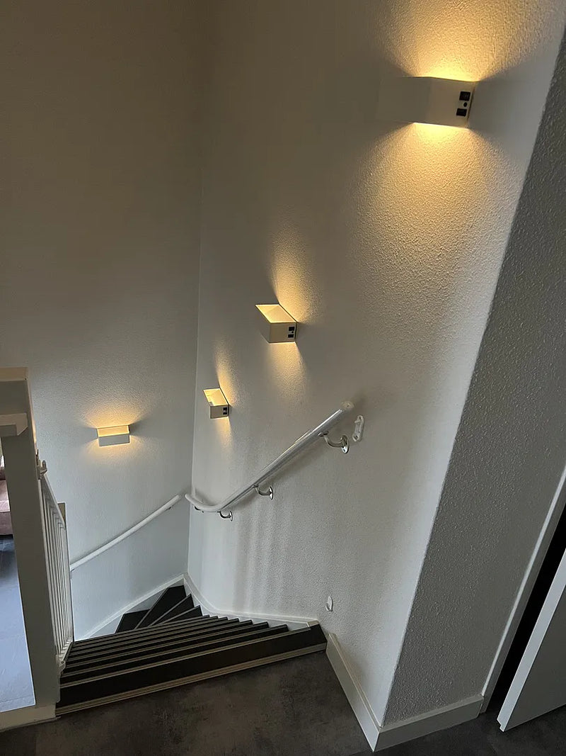 Tavellio table lamp placed on a nightstand in a customer's bedroom