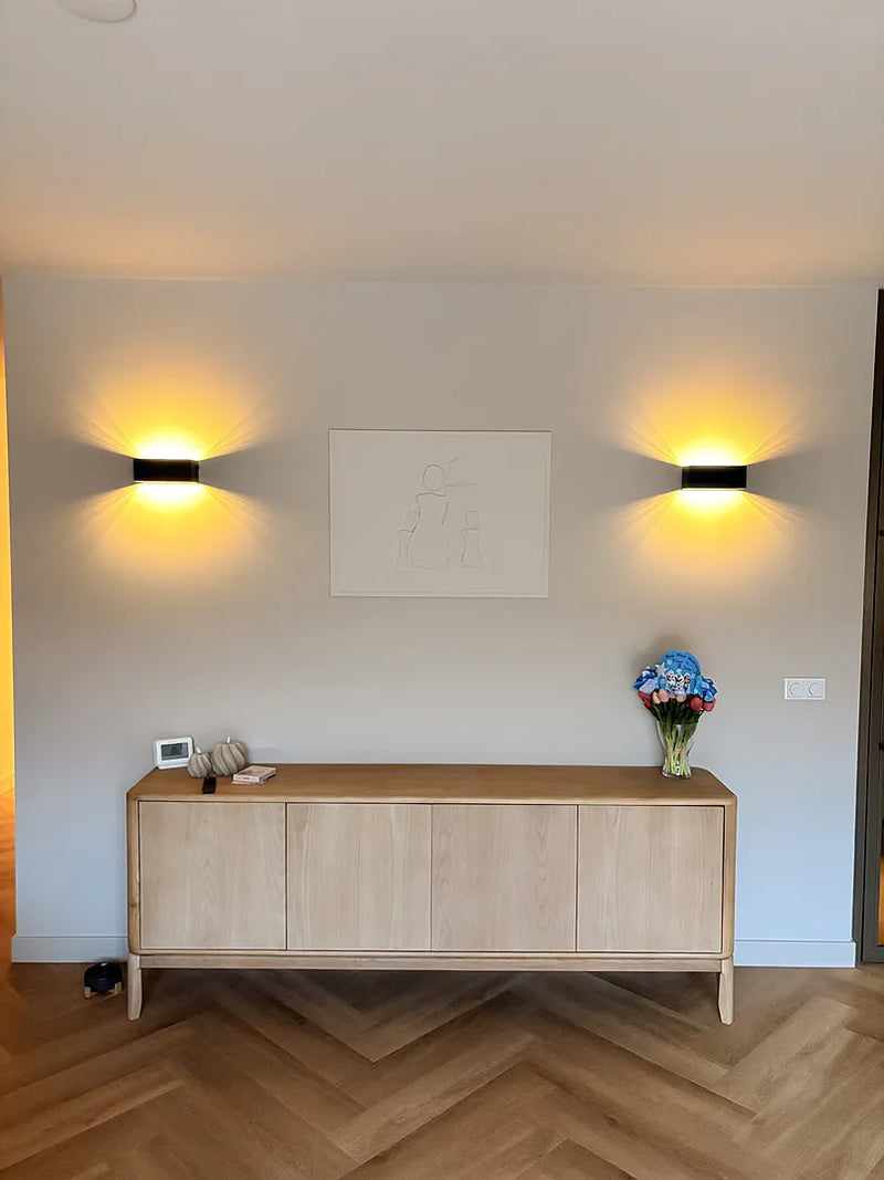 Tavellio cordless lamp styled on a customer's living room console table